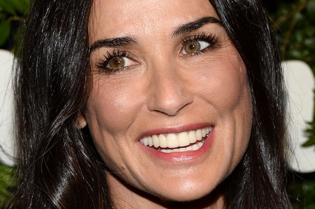 Actress-Demi-Moore-arrives-at-the-Salvatore-Ferragamo-100-Years-In-Hollywood